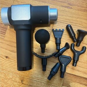 BRAND NEW in Box!  Black and Silver Massage Gun with accessories